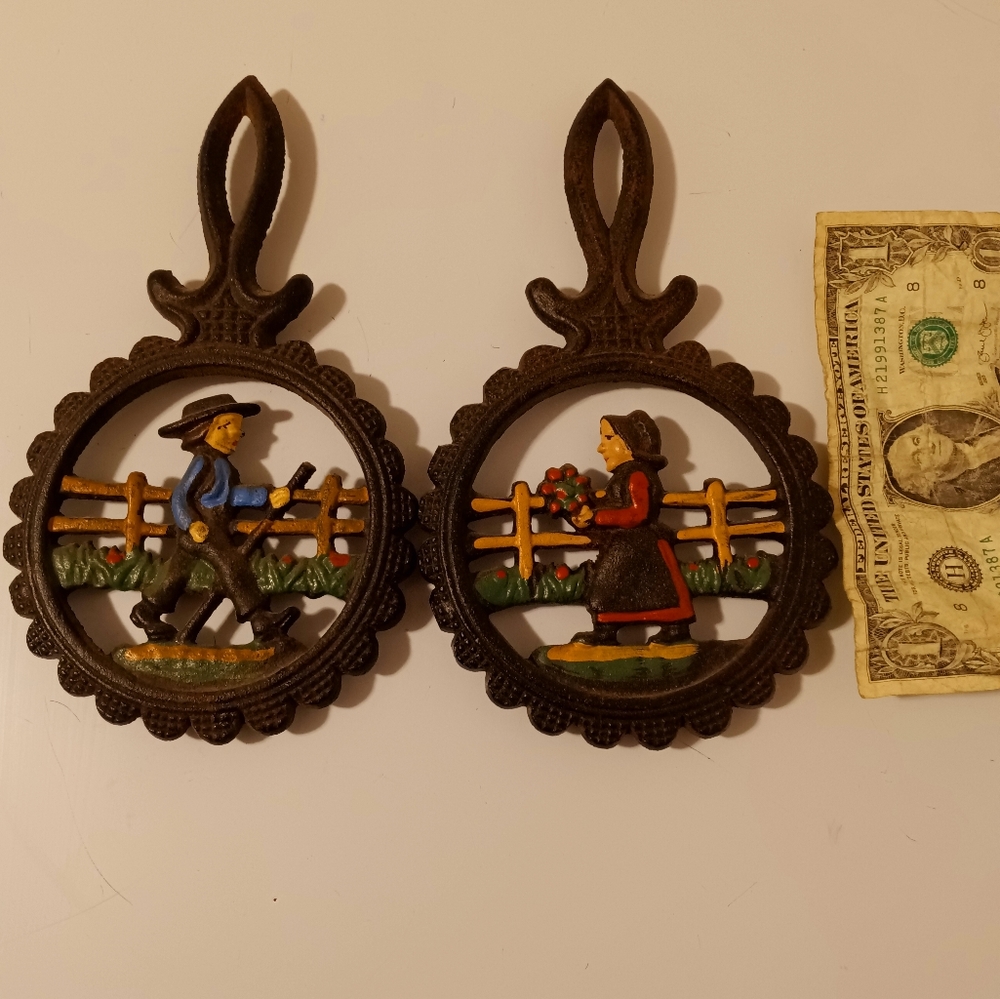 Vintage Cast Iron trivets.